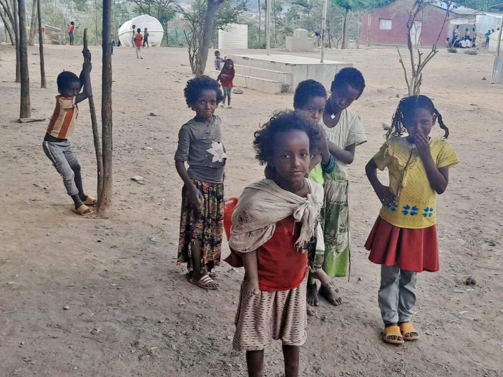 Ethiopia Children wait for food rations